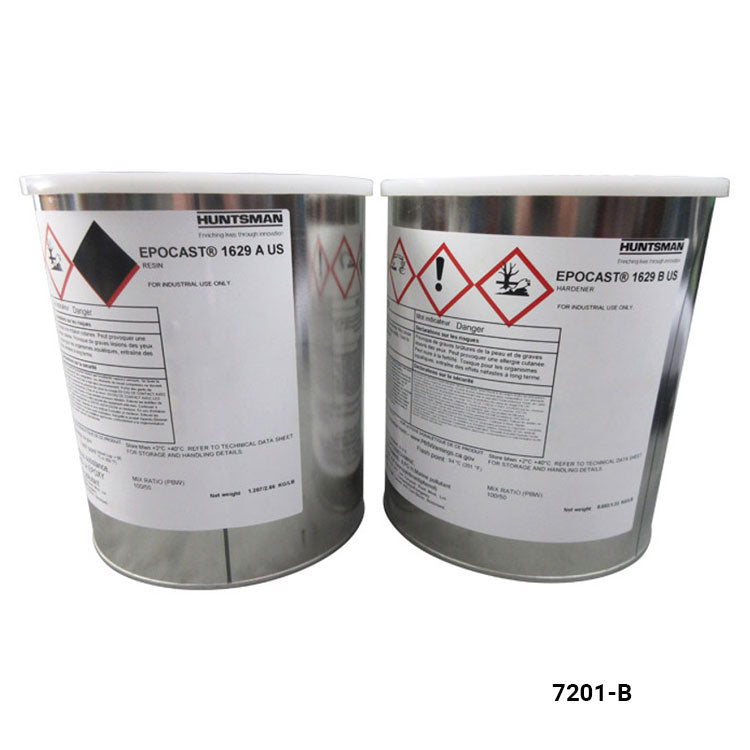 Two metal containers with hazardous material labels on a white background